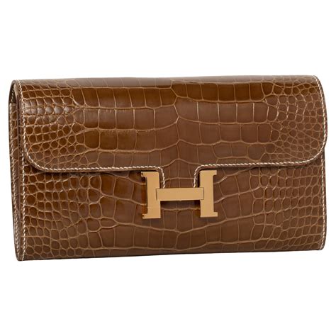 hermes constance crocodile clutch|Hermes constance crocodile price.